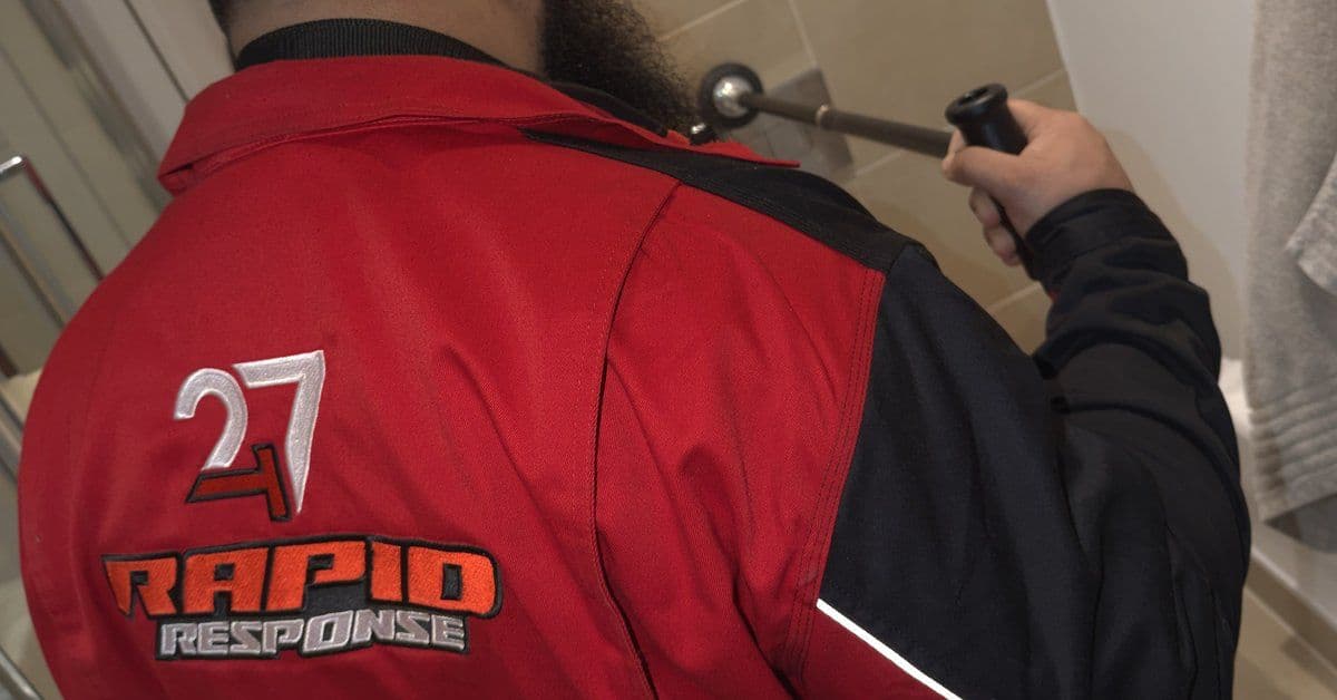 Close-up of the 247 Rapid Response branded uniform back panel, directly-employed engineer livery